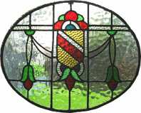 image of heraldic oval glass window .