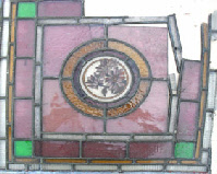 leaded panel with sections broken and missing .